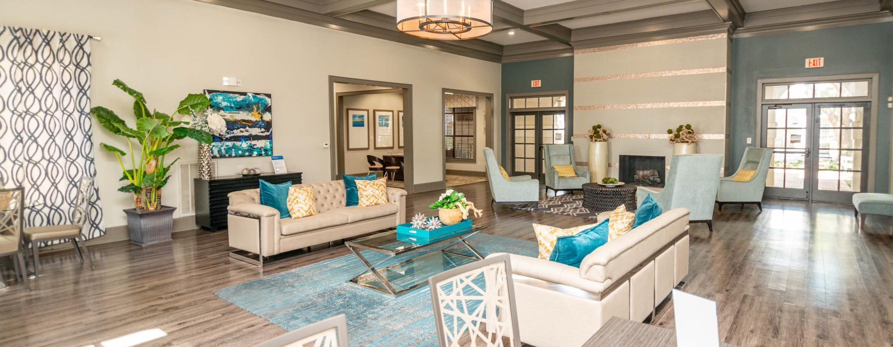 a large living room with a large pool and a large glass door